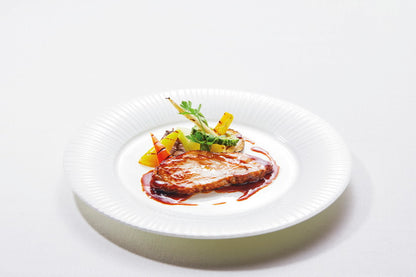 沖縄県産あぐー豚ロースの低温調理　香味野菜とイカスミのソース